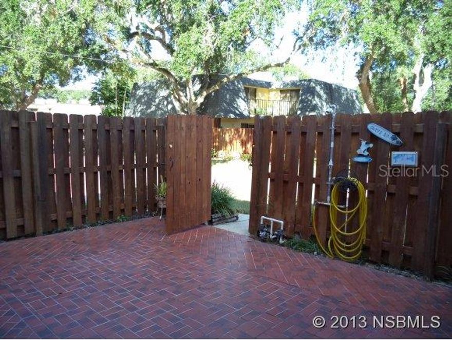 Great Cedar Dunes Unit, you can tell pride of ownership. Newly painted upstairs, new plumbing in kitchen. Fenced patio with pavers, short walk to the beach. Gas fireplace and gas dryer, Hurricane Shutters. Don't miss this one. ;Water: City