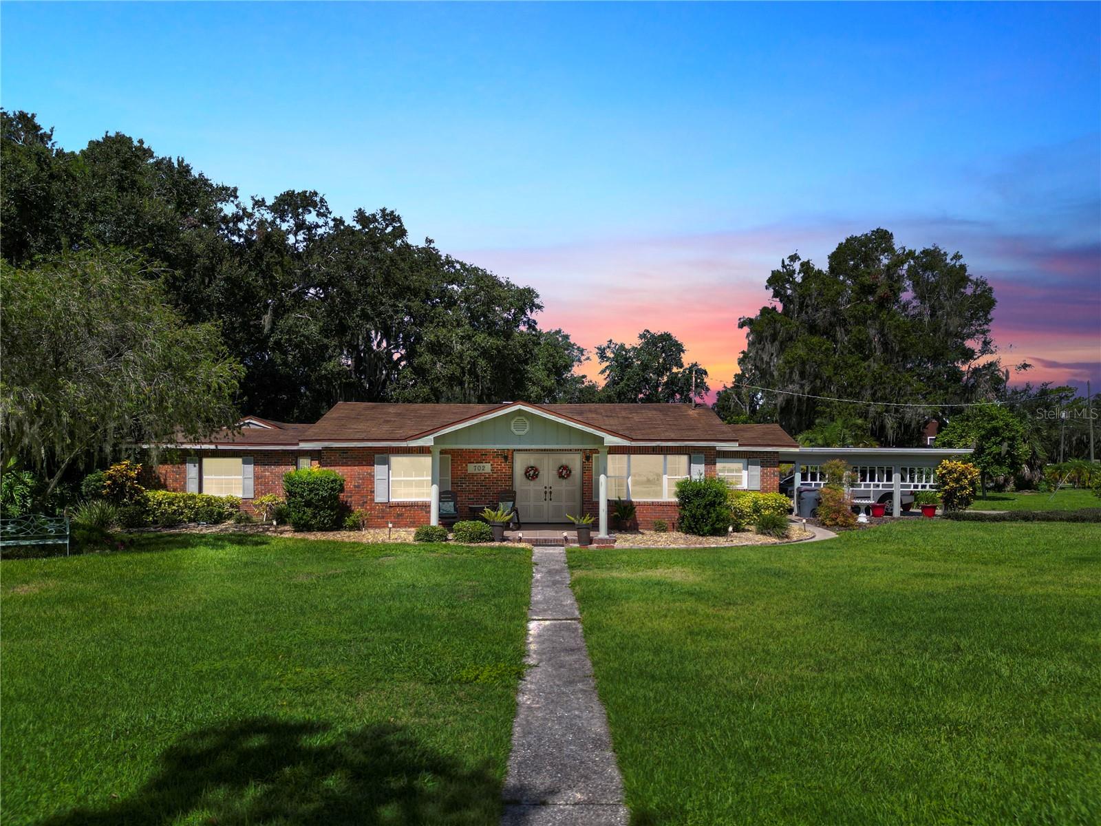 Welcome to lakefront living at its finest! This beautifully maintained 3-bedroom, 2-bath home sits on a spacious half-acre corner lot with 180 feet of private lake frontage on Lake Lena. Enjoy the Florida lifestyle with your own private dock. Perfect for boating, fishing, or simply soaking in the views.
Inside, you'll find remodeled bathrooms, oversized bedrooms, and a bright, open layout ideal for both everyday living and entertaining. The primary suite features a private entrance and a secluded patio overlooking the sparkling pool, the perfect spot to sip your morning coffee in peace.
Outdoors, enjoy the refreshing pool, two-car carport, and a workshop for all your tools and toys. Plus, with no HOA, you’ll have the freedom to make this property truly your own.
Don't miss your chance to own a piece of paradise in Auburndale! Schedule your private showing today!