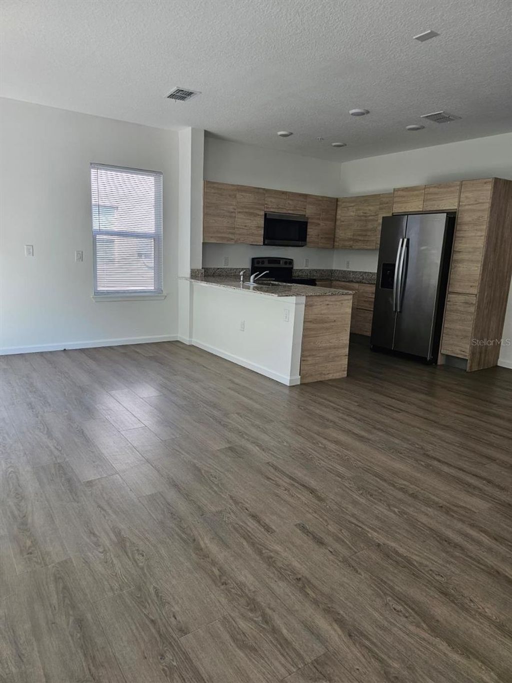 Photo of 1213 Southstation Pl #401, Orlando, FL 32809 (MLS # O6394157)