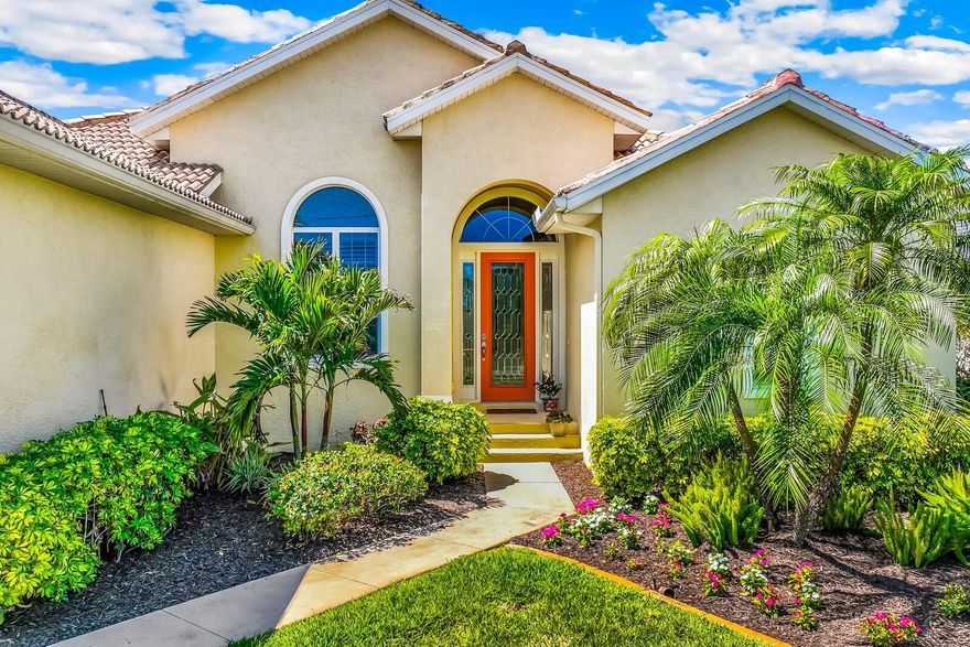 Positioned along the Cape Haze Windward golf course, this three-bedroom, three-bath residence is oriented to take full advantage of its setting, with wide views across the fairway and pond extending beyond the pool and screened lanai.

A glass entry introduces the home with a direct sightline through to the outdoor living area, creating an immediate sense of openness and connection to the landscape. Inside, the main living areas are defined by high ceilings and a tray ceiling in the great room, adding volume while maintaining a comfortable, livable scale.

The kitchen is thoughtfully positioned with stainless appliances, pantry storage, and an aquarium window that brings in natural light while framing views of the pool and golf course. It opens easily to the main living space, supporting both everyday use and casual entertaining.

The primary suite offers a quiet retreat with two walk-in closets and generous proportions. A separate den or family room provides additional flexibility, with direct access to the lanai and pool—well suited for relaxed living or hosting guests.

The screened lanai and pool area are oriented to capture long golf course and lake views, creating a backdrop that shifts throughout the day and reinforces the home’s indoor-outdoor flow.

Additional features include pull-down attic storage and a practical, well-balanced layout.

Located within the Cape Haze Windward community, the home is minutes from three marinas, the beaches of Palm Island and Boca Grande, and a range of public and private golf options, with convenient access to nearby shopping and dining.