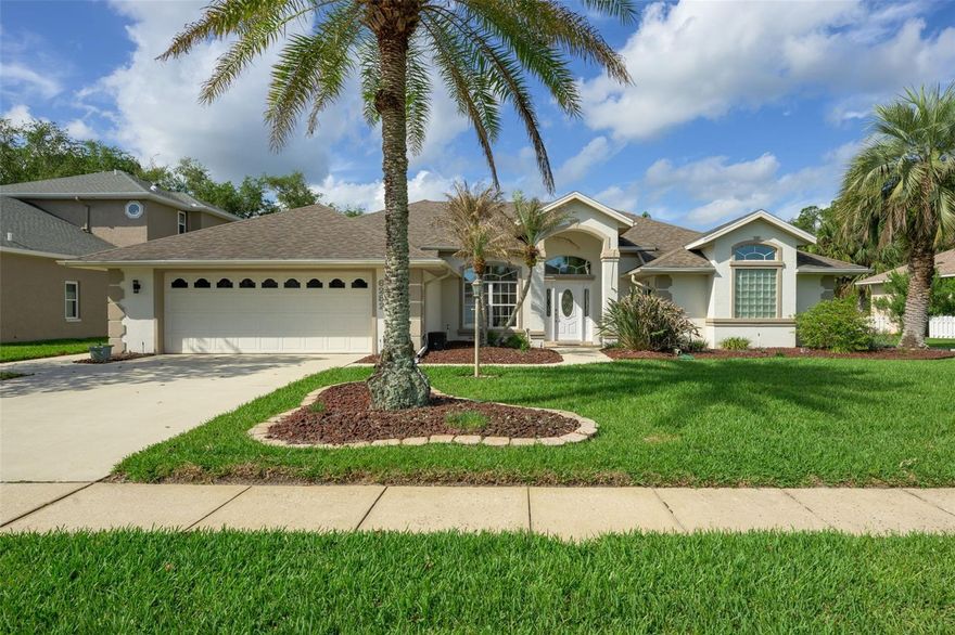 Welcome to your private retreat in the highly sought-after Cypress Head Golf Community in Port Orange, Florida! This beautifully maintained home offers 2,115 square feet of comfortable living space, thoughtfully designed for both relaxation and entertaining.
Step outside to your own backyard oasis featuring a stunning 30x18 solar-heated pool, freshly resurfaced in 2025. The expansive lanai is fully screen-enclosed, creating the perfect space to enjoy Florida living year-round, complete with a convenient roll-out shade and an outdoor enclosed shower for added comfort. Relax with serene pond views and no rear neighbors, thanks to the protected natural area behind the home, offering both privacy and tranquility.
Inside, you’ll appreciate the many updates that bring peace of mind, including a new roof (2017), water heater (2020), hot water re-circulator (2021), and HVAC system (2021). A central vacuum system adds everyday convenience throughout the home.
Car enthusiasts and golf lovers alike will love the oversized double garage, which includes a separate golf cart door—perfect for enjoying everything this golf community has to offer.
As a resident of Cypress Head, you’ll enjoy an exceptional lifestyle with access to an award-winning golf course, community clubhouse, resort-style pool, on-site restaurant, pickleball and tennis courts, and sidewalks lining both sides of the street for leisurely strolls.
This home truly combines comfort, upgrades, and an unbeatable community setting—don’t miss your opportunity to make it yours!