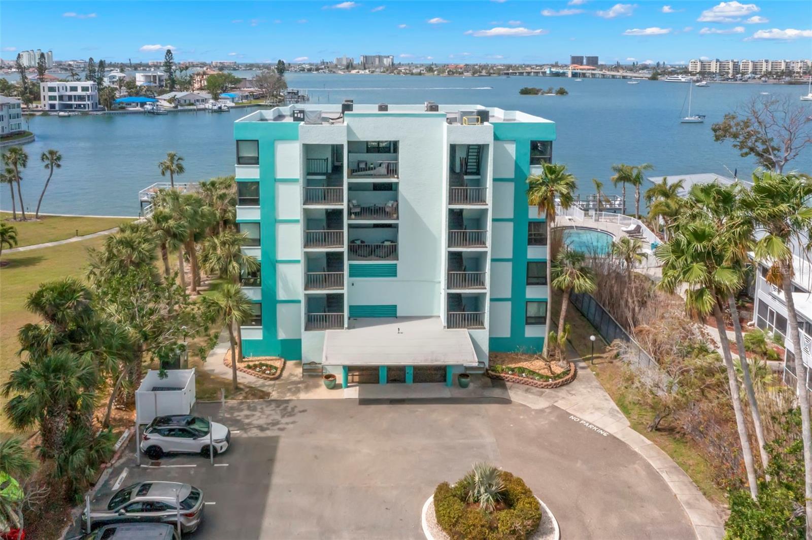 Available August - October 2025. Welcome to your waterfront retreat on Florida’s sunny Gulf Coast! Nestled in the coveted Hemingway Condos, this beautifully updated vacation home is just what you’ve been looking for. Foremost, you’ll love the breathtaking views from your private 4th floor balcony. Spend each morning sipping coffee while watching boats float by or enjoy an evening cocktail at sunset. The island life you crave is within reach.
Step inside, and you’ll notice the attention to detail throughout. Clean lines and modern comforts merge with coastal decor to create a feeling of peace and quiet luxury. You’ll appreciate the well-appointed kitchen with sleek finishes, updated appliances, and fully-equipped for easy meal-prep. An open floor plan makes conversation easy, but be warned, the stunning water views may prove a distraction to productivity. Dining and living room also embrace open-concept living, and boast both comfort and coastal elegance. Wherever you find yourself, sweeping water views await. At the end of a sun-filled day, your spacious primary bedroom provides a tranquil escape with en suite bathroom, remodeled walk-in shower and washer/dryer.
Hemingway Condo guests will love the luxurious, heated pool and hot tub which overlooks intracoastal waters. There is even a launch point for kayaks or SUP. Ready to venture further? St Pete Beach as well as Downtown St Petersburg are close by and full of opportunities. The former, offers vibrant beach bars, boat rentals, and miles of pristine sand, all with a laid back, Jimmy Buffet style vibe. The latter, downtown St Petersburg, boasts 5 star dining, museums, live theatre, shopping and waterfront strolls along the Tampa Bay. Truly the best of both worlds and all within easy reach.
Overall, this exceptional condo is a perfect blend of comfort, style, and location. Don’t miss your chance to discover Hemingway & The Sea!