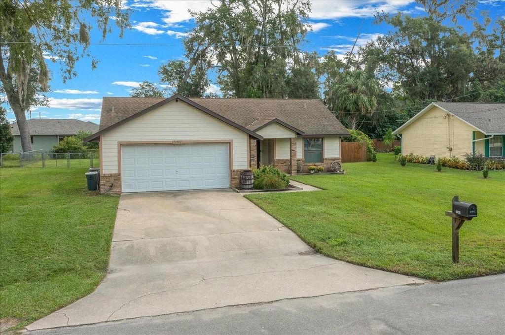 Photo of 12443 SE 62nd Avenue, Belleview, FL 34420 (MLS # OM710071)