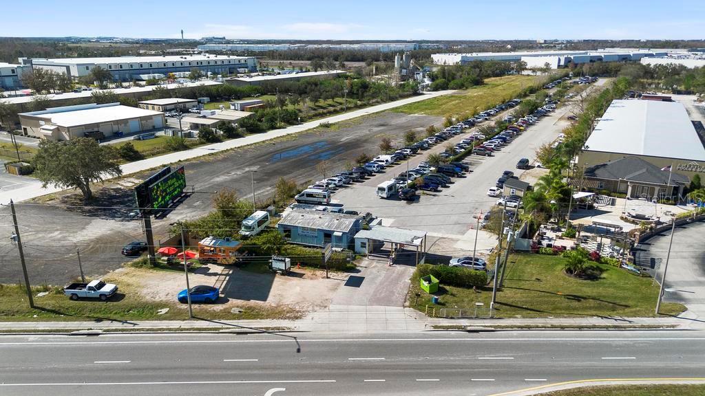 In the Fast Growing Area of Narcoossee Road Minutes from the Airport. We have 4.5.Acres of prime Land with airport parking business for Sale. A great location, hosting Gold Park & Car Rental Transportation Business, The Business Service Includes Self and Valet Parking option,
available 24/7. The business owns 3 Airport Shuttle to transport customers from and to the airport + 2 buses to transport customers from airport to Cruise lines. Outstanding opportunity for an investor looking for the value of land and business with great cash follow. Don't miss this Opportunity, it will not last long!