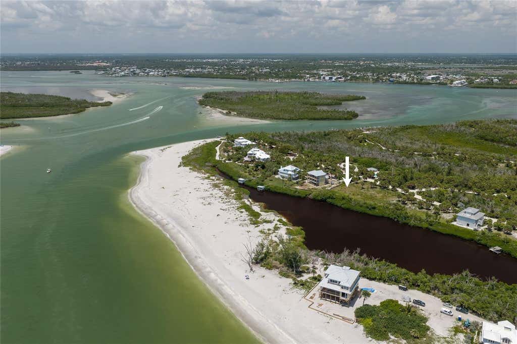 Photo of 6060 Rum Cove Drive, Placida, FL 33946 (MLS # C7528171)