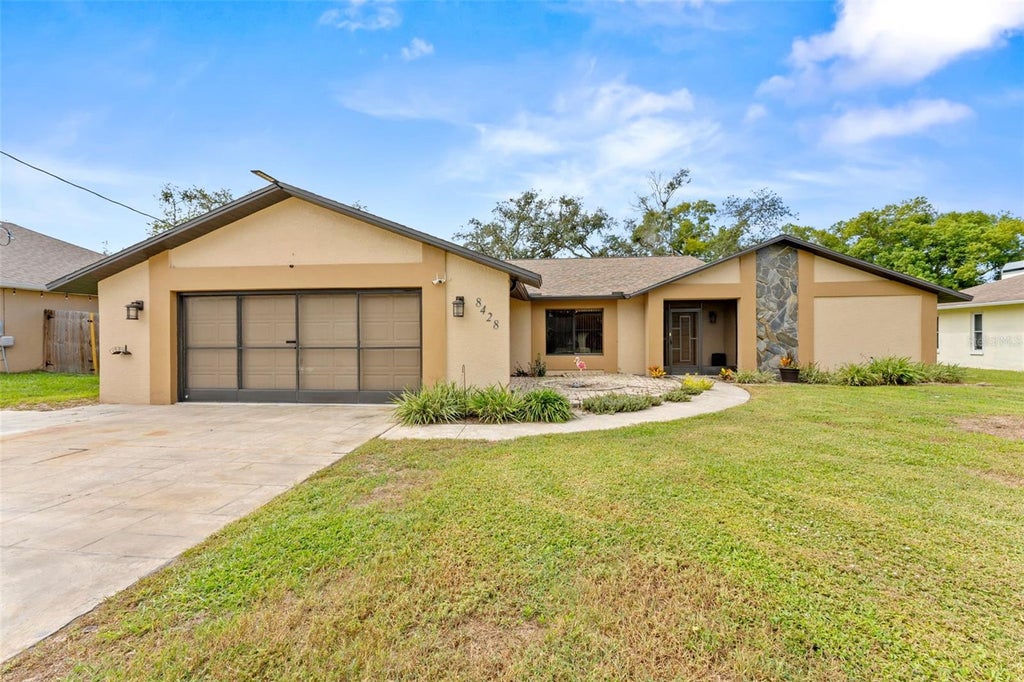 Photo of 8428 Elgrove Street, Spring Hill, FL 34608 (MLS # OM733150)