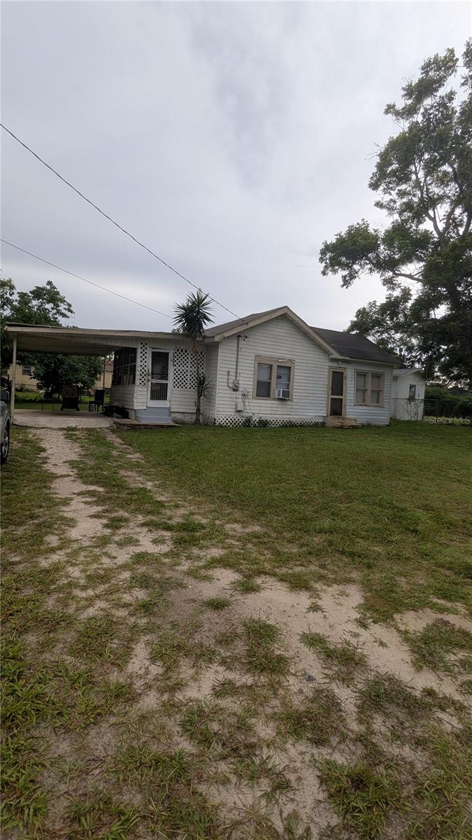 Tons of Potential! Large lot, No HOA, Investor Special! This is a single family home that was divided into two 1 bedroom units, with a bathroom and kitchen area. The home has a large front green space that and is centrally located to downtown Lakeland, I-4 and US 98. Bring your modern renovation ideas and make this home your own. Schedule a showing today.