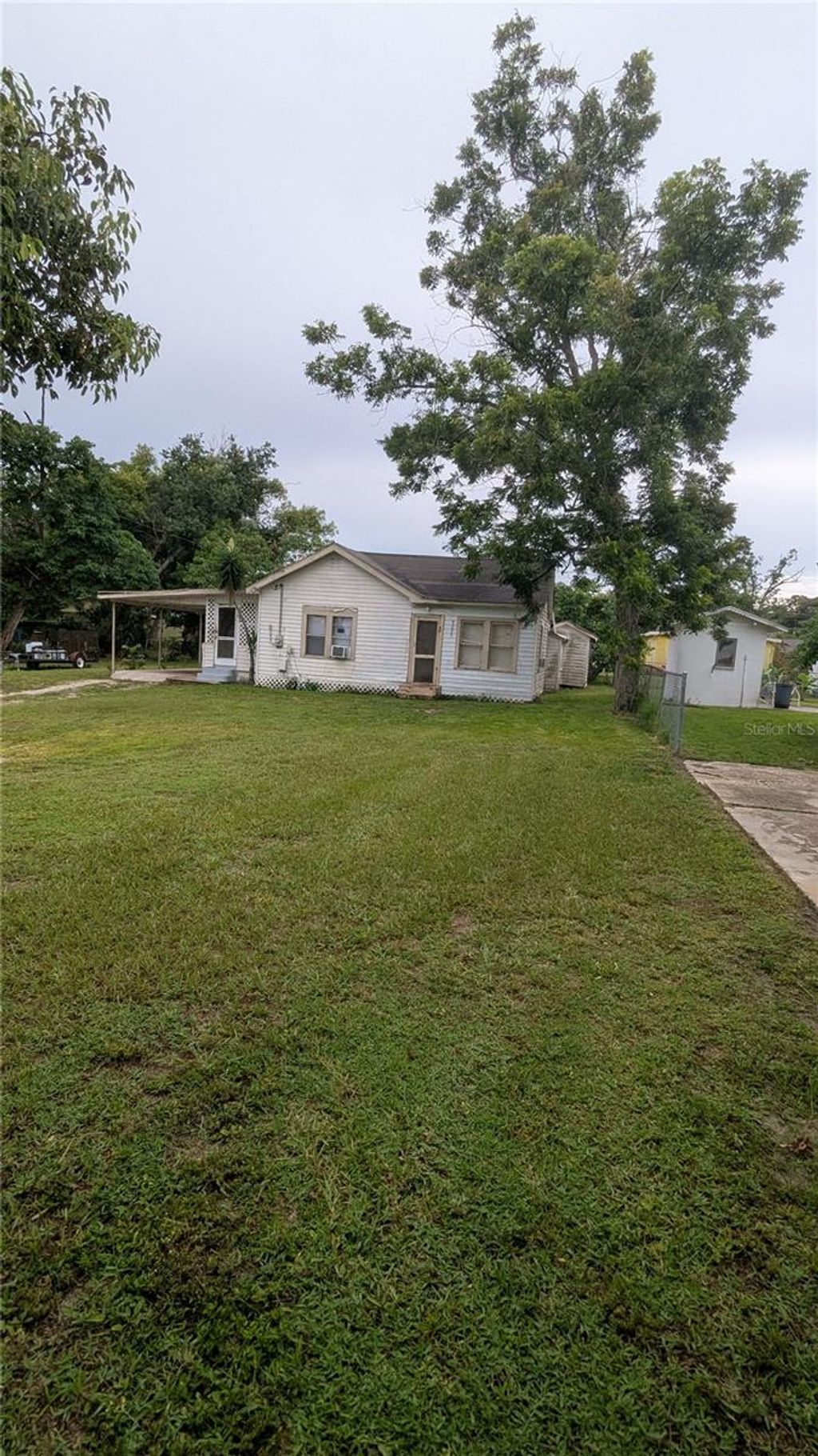 Photo of 1102 W 13th Street, Lakeland, FL 33805 (MLS # O6326715)