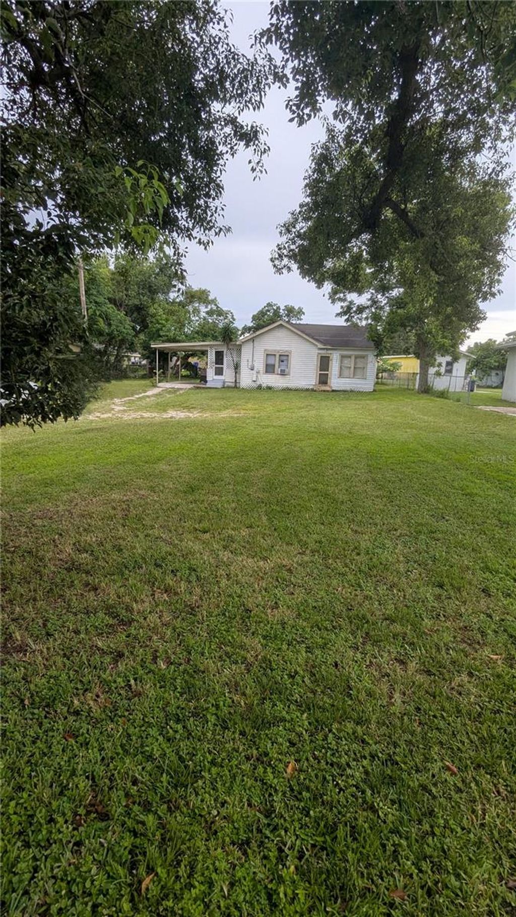 Photo of 1102 W 13th Street, Lakeland, FL 33805 (MLS # O6326715)