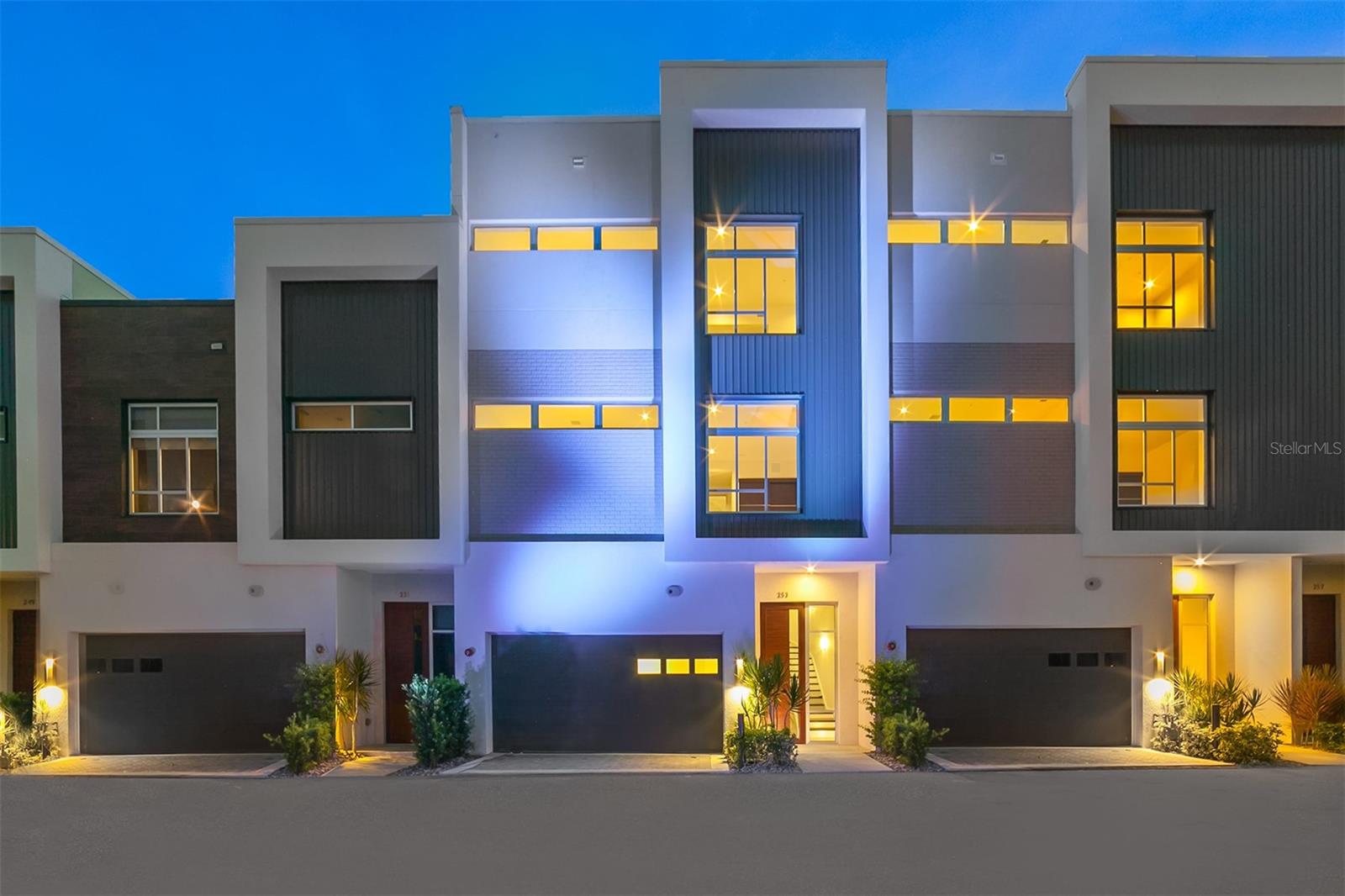 Unfurnished annual townhouse rental available now in downtown Sarasota! The ultra-contemporary three-level townhouse with two-car garage and private elevator boasts three bedrooms, three full and one half baths along with two bonus rooms. It offers stylish urban living and boasts upgraded features throughout. This unique residence includes Miami-Dade impact-rated windows and doors, Lube Italian kitchen and bath cabinetry, Bosch appliances with natural gas cooktop, Caesarstone quartz countertops and German Hansgrohe faucets. You will also discover 8-foot solid core, African rosewood interior doors, volume ceilings, a stylish freestanding soaking tub, spacious showers and large closets. There's premium porcelain tile and carpet flooring, multiple terraces, a tankless hot water system and plenty of natural light cascading through every room. This home is ideal for entertaining or just relaxing, whether you are a full-time or seasonal resident. No car is needed to get to fine restaurants, specialty stores, banks and movie theaters, and you are close to Whole Foods Market, downtown Sarasota waterfront, white sand beaches and theatrical arts. Make an appointment to visit the property and see what it's like to live at Q.