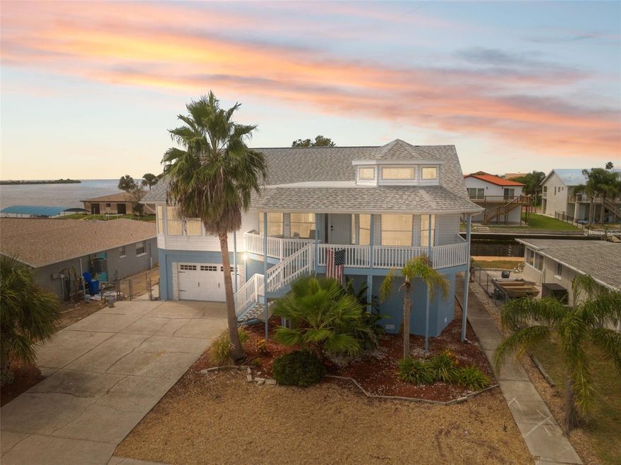 PRICE REDUCED!! Welcome to waterfront living in the sought-after Sea Ranch community of Hudson. This expansive two-story canal-front home offers direct Gulf access and blends space, function, and lifestyle with over 4,100 sq ft under roof.

Designed for flexibility, the home offers 6 bedrooms, 3 full baths, and multiple gathering areas across two levels. The main floor showcases an open living and dining space with water views, a modern kitchen with stone counters, and a generous primary suite complete with dual walk-in closets and a spa-style bath. Upstairs and downstairs living rooms provide room for entertaining, extended family, or multi-generational living, while a bonus flex room offers endless possibilities—office, gym, or game room.

Step outside to enjoy 70 feet of saltwater canal frontage, complete with a seawall and private dock. Watch the sunsets from your balcony or cast off for a day on the Gulf in minutes. With French doors, covered porches, and bay-window accents, this home balances Florida charm with contemporary finishes including tile and laminate flooring, solid wood cabinetry, and updated lighting.

Located on a quiet dead-end street yet close to marinas, dining, and the vibrant coastal lifestyle, this home is ideal as a primary residence, seasonal retreat, or investment. With no HOA, the freedom to live your waterfront dream is yours.