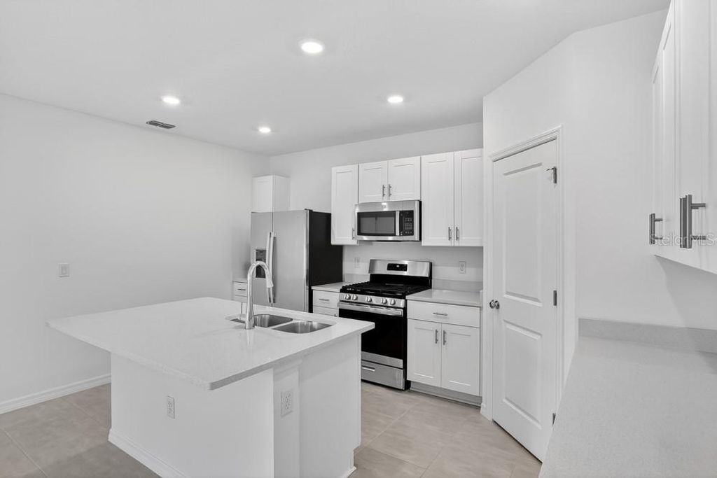 Photo of 367 Cornerstone Drive, Groveland, FL 34736 (MLS # O6400022)