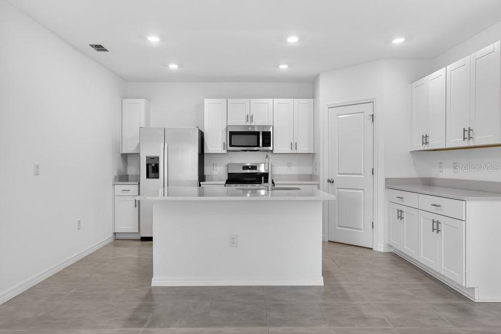 Photo of 367 Cornerstone Drive, Groveland, FL 34736 (MLS # O6400022)