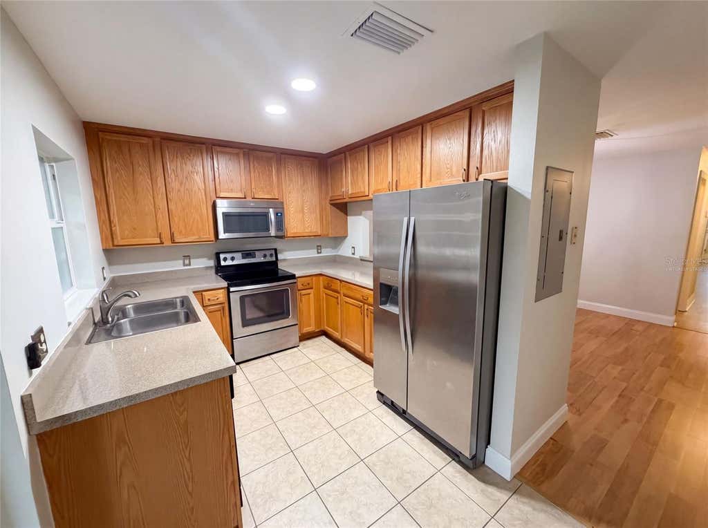 Photo of 112 Coquina Bay Drive, St Petersburg, FL 33705 (MLS # O6431639)