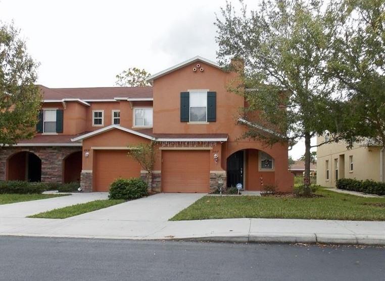 GREAT HOME IN A GREAT SPOT WITH SAVINGS THAT MAKE A DIFFERENCE IN PRICE! This 3-bed, 2.5-bath townhome features quality upgrades in 1,824 SF, from granite counters and tall wood cabinets to crown molding, decorator fans and fixtures, stainless-steel appliances, and diagonally set tile throughout the downstairs. Your water bill and grounds maintenance are covered by the landlord, so you save money and time. There's a screened lanai overlooking a backyard pond, and because it's an end unit you also enjoy a little space instead of another neighbor on the right side of the home. Beyond your private driveway and 1-car garage, guests have plenty of extra parking nearby. You're within sight of the neighborhood pool. And it's all at St. Charles Place, a convenient location along U.S. 301 near schools, shops, restaurants, recreation options and easy routes to downtown Tampa or Gulf beaches! This home is managed professionally and locally for your peace of mind.
