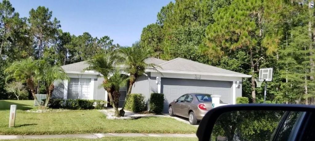 Photo of 13203 Royal George Avenue, Odessa, FL 33556 (MLS # J989841)