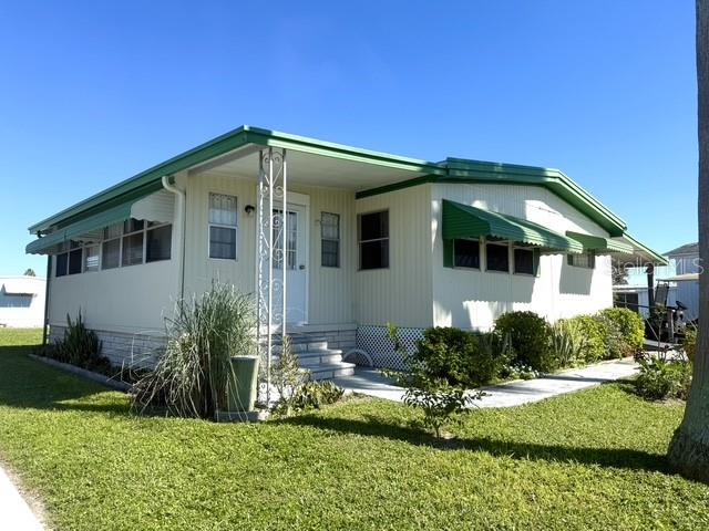 Photo of 113 W Saint Lucia Loop, Apollo Beach, FL 33572 (MLS # TB8561160)