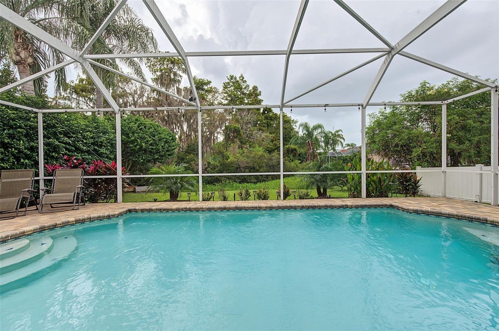 Photo of 10440 Tecoma Drive, Trinity, FL 34655 (MLS # W7890135)