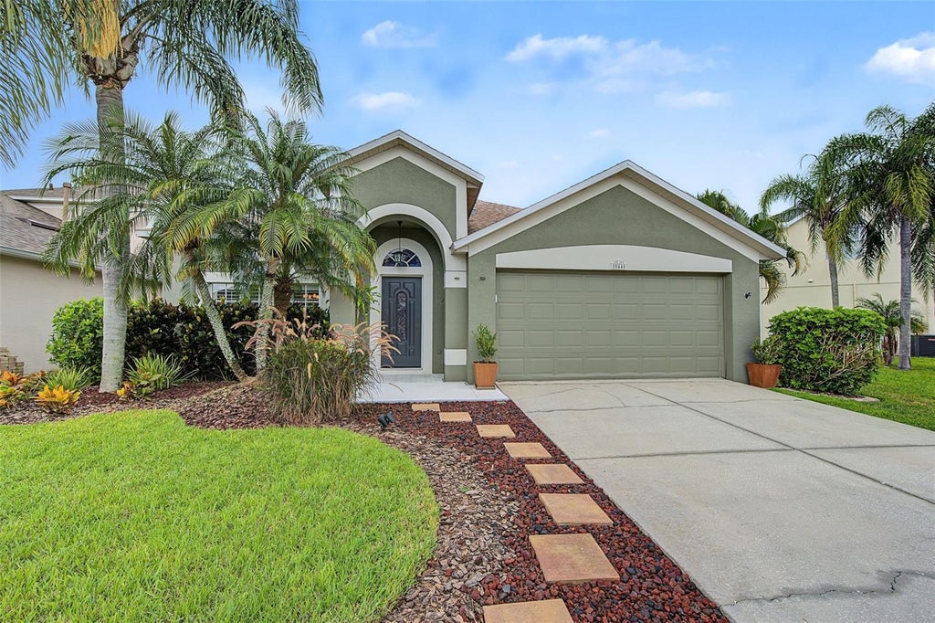 Photo of 10440 Tecoma Drive, Trinity, FL 34655 (MLS # W7890135)