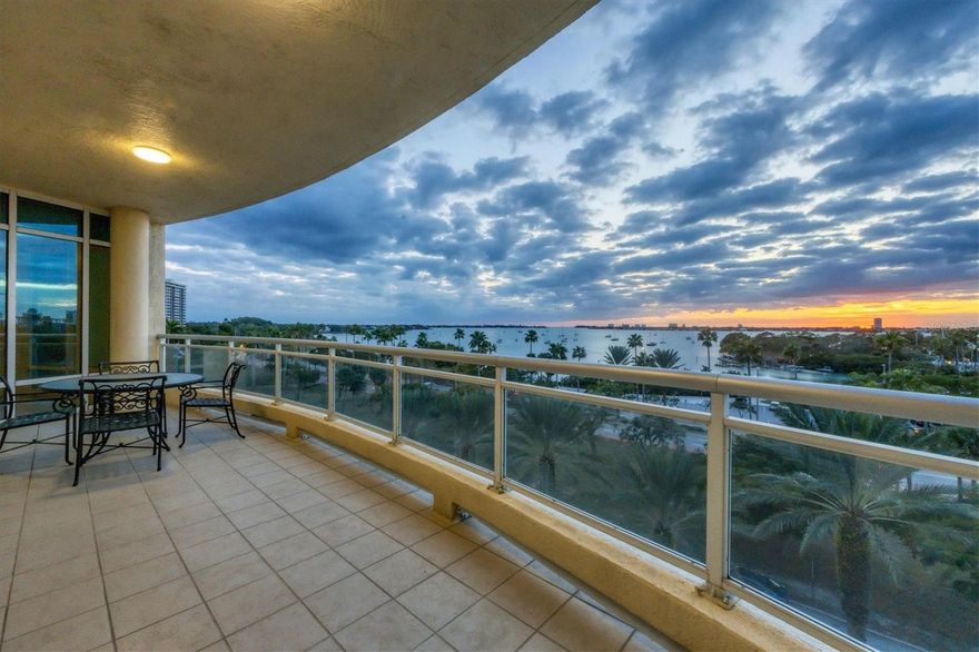 Indulge in captivating bay views and luxurious downtown living from this exquisite third-floor residence at Sarabande! In the heart of downtown Sarasota, this upscale full amenity building offers an unparalleled location overlooking bayfront and marina. Step into the bright functional floor plan adorned with floor-to-ceiling windows or enjoy the spacious terrace, both of which invite you to bask in awe-inspiring water vistas, sunsets and city views. This unit features two bedrooms along with a versatile private office that easily transforms into a third bedroom. The kitchen blends elegance and practicality, boasting a suite of appliances including a built-in oven, refrigerator, microwave and induction cooktop. Additional highlights include counter-height seating, a central island, a dedicated workspace, beverage cooler, bottle storage and a dining area enveloped in expansive windows. The primary bedroom offers direct access to its own private terrace with captivating city vistas, complemented by two custom walk-in closets and a spa-like bath for relaxation. Included with this residence are two deeded parking spaces and extra storage. Sarabande caters to your every need with 24-hour concierge service, two pools and an invigorating spa. Revel in self-care at the fitness center, relax in the massage and steam rooms, entertain guests in the clubroom complete with a catering kitchen or take advantage of other amenities including a library, wine storage, and two guest suites. Immerse yourself in the quintessential downtown Sarasota lifestyle by making this exceptional residence your own, where every detail offers sophisticated living at its finest.