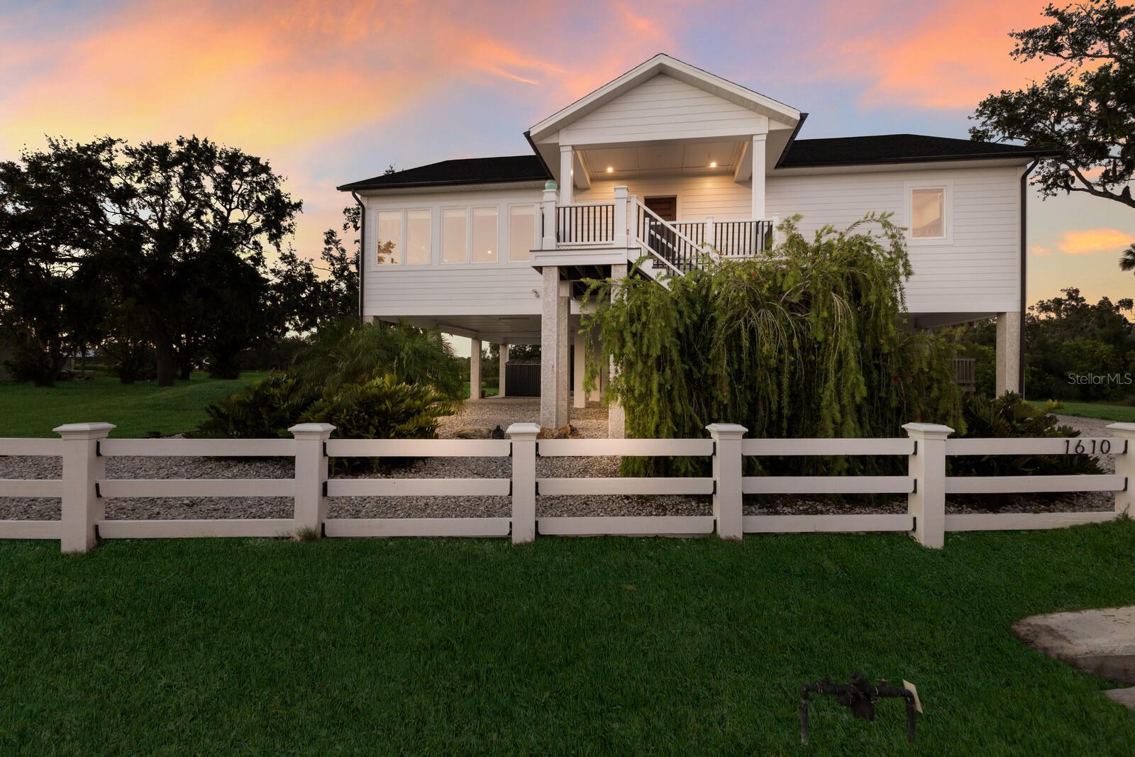 Welcome to a rare opportunity on the historic and naturally breathtaking Terra Ceia Island—where Old Florida charm, serene coastal beauty and modern luxury converge. Custom built in 2020 with commercial-grade materials and engineering standards, this exceptional residence was thoughtfully designed for lasting strength, style and comfort. Offering five bedrooms and four full baths, the home features soaring ceilings, gracious open living spaces and a full-size elevator for effortless convenience upon arrival, ideal for transporting groceries or luggage from a relaxing vacation that is also wheelchair accessible. Partially furnished, the residence allows for immediate occupancy with ease, whether for year-round living or a seasonal escape. Enjoy the kayak, paddleboard and boat launch steps from your front door. Additionally, the HOA exclusive dock to accept guests for visitors or fishing, or a coffee at sunrise or beverage of choice, for the majestic sunsets. Positioned and fastened in the ground, this home experienced no flooding or water intrusion during recent storms, according to the owner, testament to its elevated construction and careful site planning. There’s also ample room to add a private pool, completing your personalized Florida oasis. Tucked within the secluded beauty of Terra Ceia, residents enjoy a laid-back island lifestyle with easy access to boating, fishing and nearby preserves, yet you're just moments from the vibrant culture of St. Petersburg, Bradenton and Anna Maria Island.