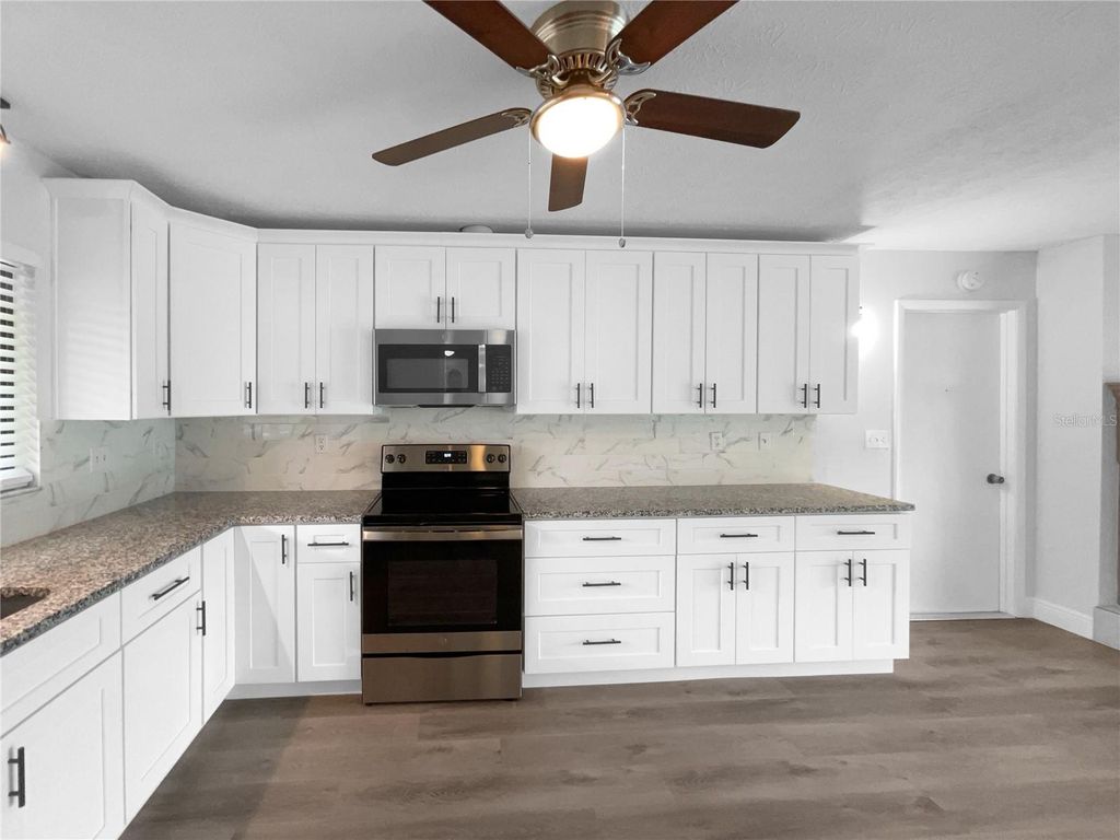 Photo of 35035 Dolphin Lake Drive, Zephyrhills, FL 33541 (MLS # O6222980)