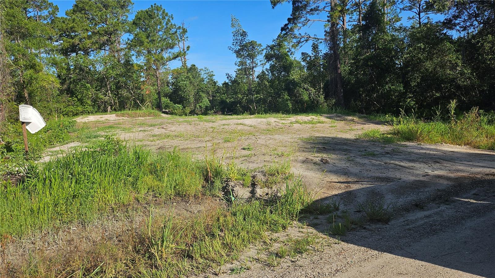 Ready to be built! Septic Tank already in, land cleared, set plans if needed for new owner. Permits were already issued and will just need to be updated for new plans if desired. Owner already has plans, survey including building stakeout. Most of the fill dirt already put in, temporary culvert and full estimates available if buyers will use the same house plans as it currently permitted. This lot is ready to go. Will need well. Close to shopping areas with easy access to I-4 and downtown Deland. No HOA in really quite area of Daytona Park Estates. Lots of new build going on.