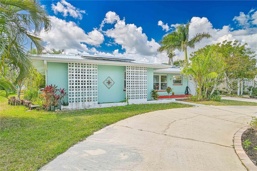 Welcome to a thoughtfully updated 3-bedroom, 2-bath pool-home in Cape Coral, where comfort, privacy, and efficiency come together for a true coastal oasis. Step into an inviting, light-filled living space with luxury vinyl flooring throughout, all hurricane-impact windows and sliders, and a 2018 metal roof built to last. The beautifully refreshed kitchen featuring quartz countertops, large breakfast bar, new lower cabinetry, and all-new appliances (2022) sets the stage for easy everyday living and effortless entertaining. The primary suite offers both a walk-in and an additional large closet plus a charming ensuite bath.
Enjoy your own private retreat outdoors with an updated saltwater pool and safety fence (2018), stone paver deck, and a large covered rear porch ideal for enjoying a relaxed, tropical lifestyle. Lush landscaping, koi pond garden, and partially fenced perimeter create exceptional privacy. The circular driveway provides plentiful parking and curb appeal, framed by greenery and mature palms.
The home is packed with value and peace of mind, including a newer HVAC system (2022) and solar panels (2021) that keep the electric bill low, under $48/month, and 2018 re-pipe. Additional highlights include a laundry room with utility sink and newer washer/dryer, a finished insulted 1-car garage, a storage shed, and brand-new flood barrier equipment. Ideally located just minutes from boating and fishing, Fort Myers Beach and Sanibel Island, and 5 minutes to downtown Cape Coral, this home delivers the Florida lifestyle you've been looking for with comfort, convenience, and coastal charm all in one.