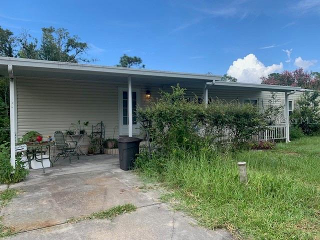 Large 3 bedroom. 2 bath with large Florida room, enclosed porch double wide Mobile Home on a little over an half acre on a dead end street. This home has so much storage and a large kitchen with breakfast bar and two pantries, separate dinning room, large living room and split plan which is perfect for a larger family or for entertaining. Plenty of room for guest parking. Flooring in some areas are soft and need to be repaired. Needs some TLC and a little elbow grease. Great location close to shopping, Restaurants, beaches, parks and a short distance to the Suncoast Parkway for easy commute to Clearwater, Tampa and the Tampa Airport. Any furniture or personal belongings that will remain at the premises at closing is for the convenience of sellers. List price reflects work needed.