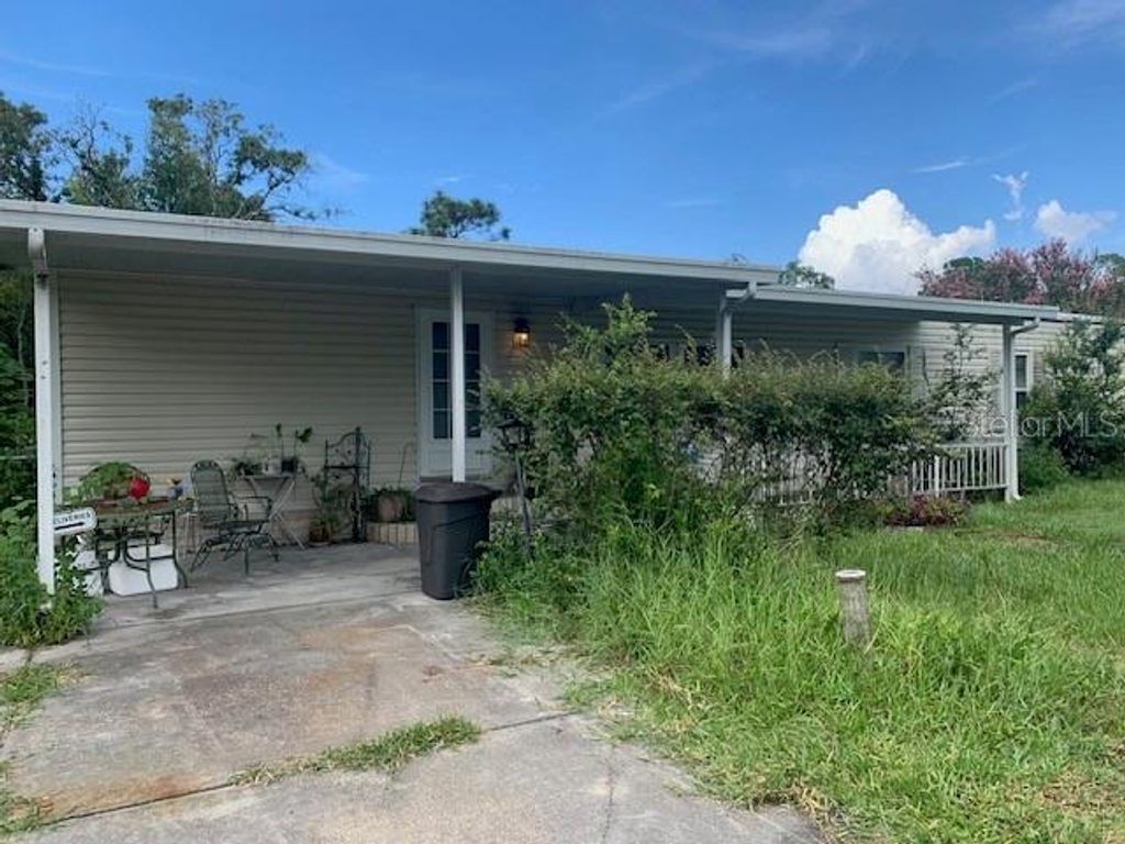 Photo of 9633 Ray Street, Hudson, FL 34669 (MLS # W7878063)
