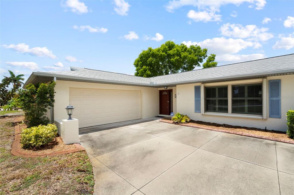 Photo of 6408 29th Avenue W, Bradenton, FL 34209 (MLS # A4695636)