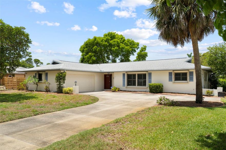 Welcome to this beautifully maintained 3-bedroom, 2-bathroom home with a 2-car garage in the highly desirable neighborhood of The Crossings. Ideally located in West Bradenton, you'll enjoy convenient access to shopping, dining, medical facilities, recreation, and the stunning beaches of Anna Maria Island. Designed with both comfort and functionality in mind, the home features a welcoming entry that opens to a formal living and dining area. The updated kitchen boasts all-wood cabinetry, abundant counter space, and an extended countertop perfect for entertaining. It flows seamlessly into the spacious family room, creating an ideal gathering space. The generously sized primary suite offers an updated closet system and a private ensuite bath. Bedrooms two and three are also oversized, providing flexibility for family and guests.  Additional updates include plantation shutters, laminate flooring, impact windows throughout, and exterior accordion hurricane shutters for added peace of mind. Other highlights include an enclosed lanai perfect for morning coffee, an outdoor patio for birdwatching, and a fenced backyard offering privacy. Major updates include a new irrigation well pump (May 2026), HVAC system (2024), roof (2021), and water heater (2020). Outdoor enthusiasts will appreciate the home's proximity to G.T. Bray Park, offering sports fields, a dog park, aquatic center, tennis and pickleball courts, playgrounds, and more. This home combines modern updates, exceptional protection, and an unbeatable location—without the burden of HOA fees. Don't miss this opportunity to own a piece of West Bradenton living at its best!