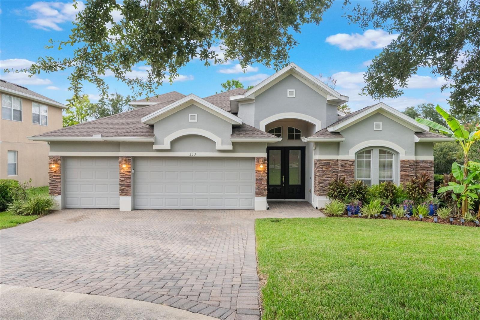 This stunning 5-bedroom, 4-bathroom home at 313 Courtlea Park Dr in Winter Garden is priced below APPRAISED VALUE, offering exceptional value in one of Central Florida's most desirable communities. Located just minutes from Historic Downtown Winter Garden, you'll have easy access to boutique shopping, award-winning restaurants, the popular farmers market, and year-round community events.
This 3,152 square foot home sits on a quiet cul-de-sac with beautiful brick paver driveway and conservation area in the back. The open floor plan features a renovated kitchen with updated cabinets, countertops, and modern appliances. All bathrooms have been thoughtfully updated, and the large den offers flexible space perfect for a home office, media room, or playroom.
Recent upgrades include a new roof in 2023, A/C system in 2025, and fully paid-off solar panels for energy savings. The property offers extra parking and safe spaces for children to play and ride bikes with minimal through traffic.
Outdoor enthusiasts will love the nearby West Orange Trail for biking, jogging, and evening walks. The home is conveniently located within the golf cart district, providing charming golf cart access to downtown Winter Garden's attractions.
This home combines modern updates with practical living in a family-friendly neighborhood. The conservation area provides natural privacy while the location offers both tranquility and convenience. With its below-appraisal pricing and premium features, this property presents an excellent opportunity for buyers seeking quality and value in Winter Garden.