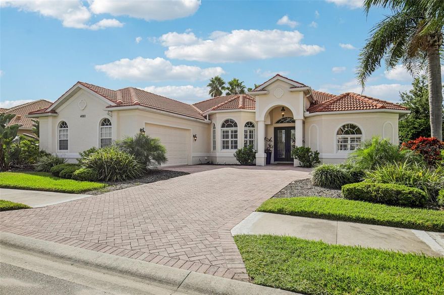 Welcome to 4880 Via San Tomaso Dr, Venice — a stunning 3-bedroom, 2-bath pool home in the gated, award-winning Venetia community. Spanning 2,688 sq ft of beautifully designed living space, this residence blends elegance, comfort, and tranquility with serene preserve views and lush tropical landscaping.
Open the gorgeous double glass French doors to discover soaring ceilings, formal living and dining rooms, and an expansive great room overlooking the sparkling pool and lanai.  The oversized eat-in chef's kitchen features beautiful granite countertops, new stainless appliances, a double sink, a center island with wine rack, a wine fridge, and more than enough storage for all your kitchen gadgets.  The breakfast nook is framed by the giant aquarium window showcasing the pool, spa and lush preserve —a perfect backdrop for casual meals or morning coffee.  Two sets of triple glass sliders allow for seamless indoor / outdoor entertaining.
The split-bedroom layout ensures privacy, with a primary suite that serves as a true retreat—large enough for a king bed and sitting area, offering two walk-in closets (one massive!), and a remodeled bath with dual vanities. Wake up and feel refreshed each day by views from your bed of your pool and preserve through the double glass sliding doors.
Recent updates include new stainless-steel appliances (washer, dryer, dishwasher, range), new exterior paint, HVAC 2018, hot water heater 2020, and a tiled-roof tune-up ensuring peace of mind for years to come. Additional features: hurricane shutters, central vacuum, side-entry 2-car garage with workbench and extra storage, and an oversized paved driveway.
The Venetia lifestyle offers something for everyone — a resort-style pool, fitness center, pickleball, tennis, bocce, basketball, and a magnificent clubhouse for community gatherings. Just minutes from pristine Gulf beaches, historic downtown Venice, Wellen Park, shopping, dining, and the Legacy Trail.
Whether you’re seeking a permanent slice of Florida heaven or a peaceful seasonal retreat, this residence captures the best of coastal-meets-casual living in one of Venice’s most cherished communities.