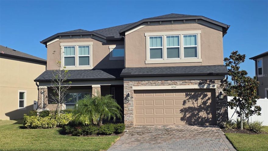 You are viewing a stunning 5-bedroom, 3-bathroom home with a 2-car garage, nestled in the highly sought-after Chapel Crossings community of Wesley Chapel. Boasting wood laminate flooring throughout, soaring ceilings, and an open, airy floorplan, this residence perfectly blends comfort, style, and functionality.

The chef’s kitchen is the heart of the home, featuring stainless steel appliances, granite countertops, a spacious kitchen island, and ample cabinetry—ideal for cooking, entertaining, or enjoying a cozy family meal. Upstairs, a versatile loft offers flexible living space, perfect for a media room, play area, or game room.

Retreat to the luxurious primary suite, complete with an en-suite bath featuring dual sinks, a large garden soaking tub, and a walk-in shower for ultimate relaxation. For added convenience, the washer and dryer are included.

Step outside to the screened-in patio, perfect for morning coffee or evening gatherings, overlooking a large, fenced backyard—ideal for pets, play, or entertaining. Enjoy resort-style amenities within the community, including a sparkling pool, playground, and fitness center.

All this is complemented by a prime location close to major highways, shopping, dining, and top-rated schools. Don’t miss your chance to live in one of Wesley Chapel’s most desirable communities—schedule your showing today!