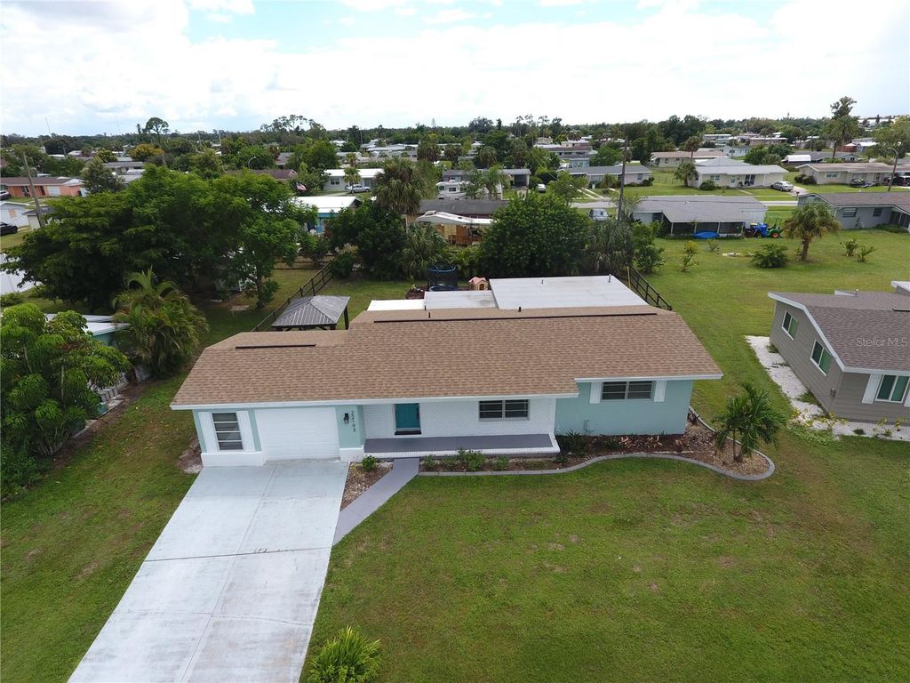 Photo of 22193 Breezeswept Avenue, Port Charlotte, FL 33952 (MLS # C7515956)