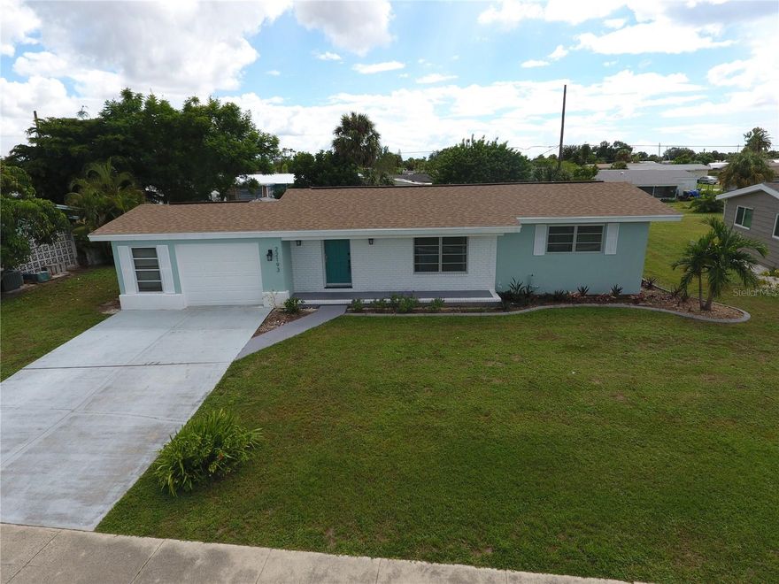 This charming single-family home offers 3 bedrooms, 2 bathrooms, and a 1-car garage in a convenient location close to shopping, dining, and local amenities. Enjoy timeless terrazzo flooring throughout (except Primary bedroom) and an inviting floor plan that flows into a bright, air-conditioned enclosed lanai—ideal for additional living space, office, or hobby area. The fenced backyard provides privacy and features a spacious pavered patio, perfect for outdoor dining and entertaining. A newer roof installed in 2022 offers added peace of mind. No flood zone and no HOA fees make this home an excellent option for year-round living or investment. Move-in ready and full of potential—schedule your private showing today!
