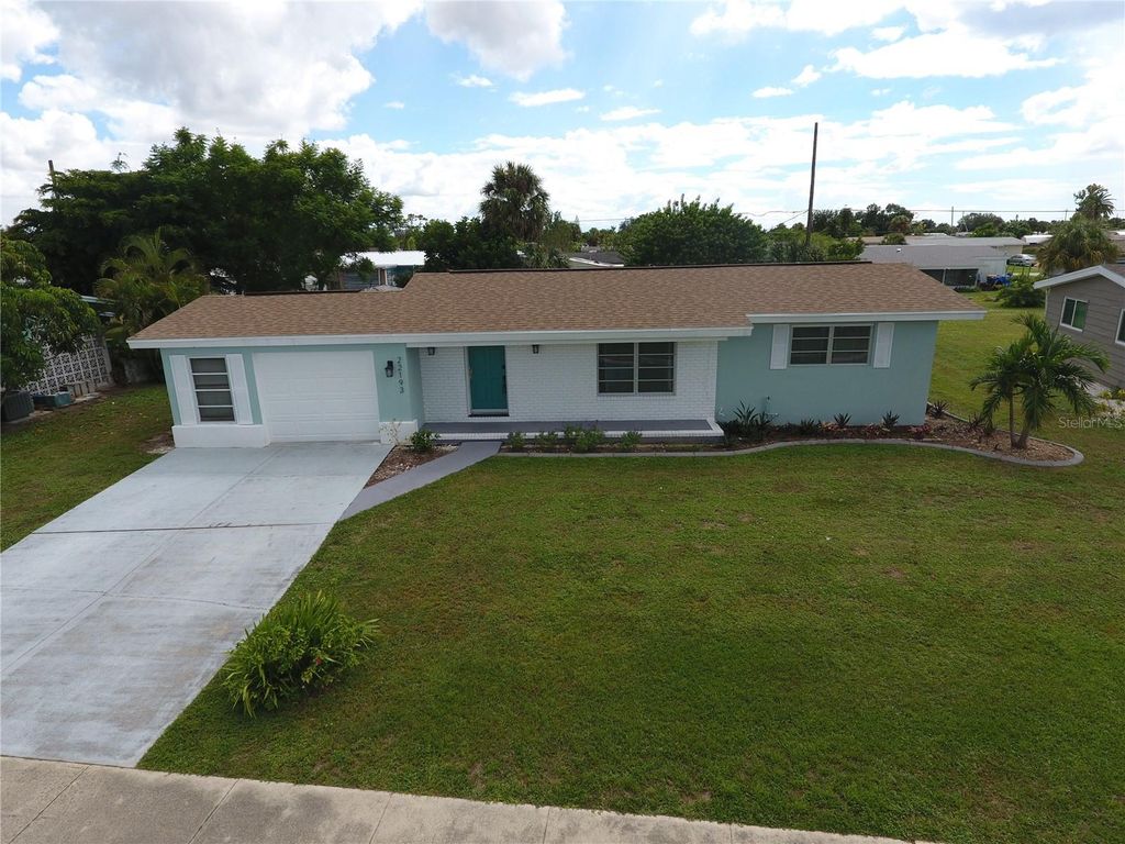 Photo of 22193 Breezeswept Avenue, Port Charlotte, FL 33952 (MLS # C7515956)