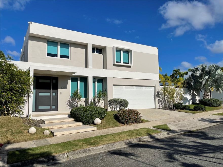 Available December 1, 2025, this fully remodeled residence is located in the gated community of Sierra del Río in San Juan. The two-story home offers approximately 3,200 square feet of living space with 4 bedrooms, including one currently converted into a home office, and 2.5 bathrooms. The open-concept layout connects the living, dining, and family areas directly to the terrace and a private in-ground pool, creating an ideal setting for entertaining and comfortable living. The kitchen has been fully renovated with modern finishes and a functional design. Additional highlights include a full power generator, full water cistern, solar water heater, water softener, two covered parking spaces, and hurricane-resistant security windows. The property is situated within a gated community that offers 24/7 security and controlled access, along with amenities such as tennis, basketball, soccer, and racquetball courts, a gazebo, and a playground area. Rent is $6,500 monthly, offered unfurnished.