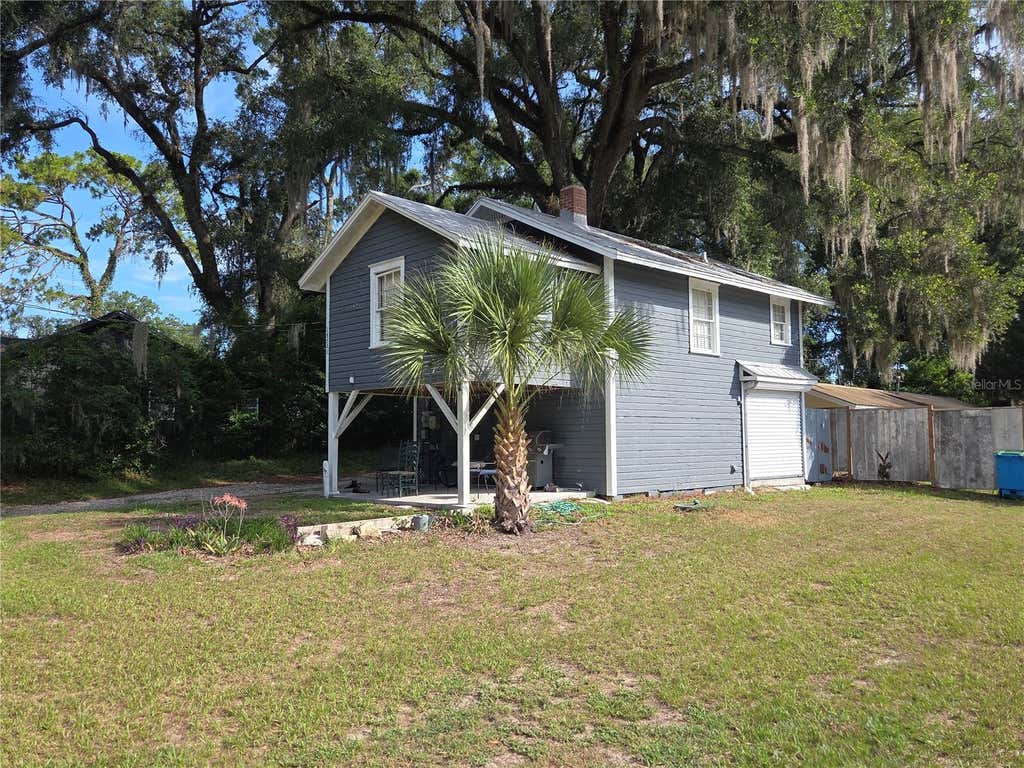 Photo of 18758 NW 243rd Terrace, High Springs, FL 32643 (MLS # TB8541805)