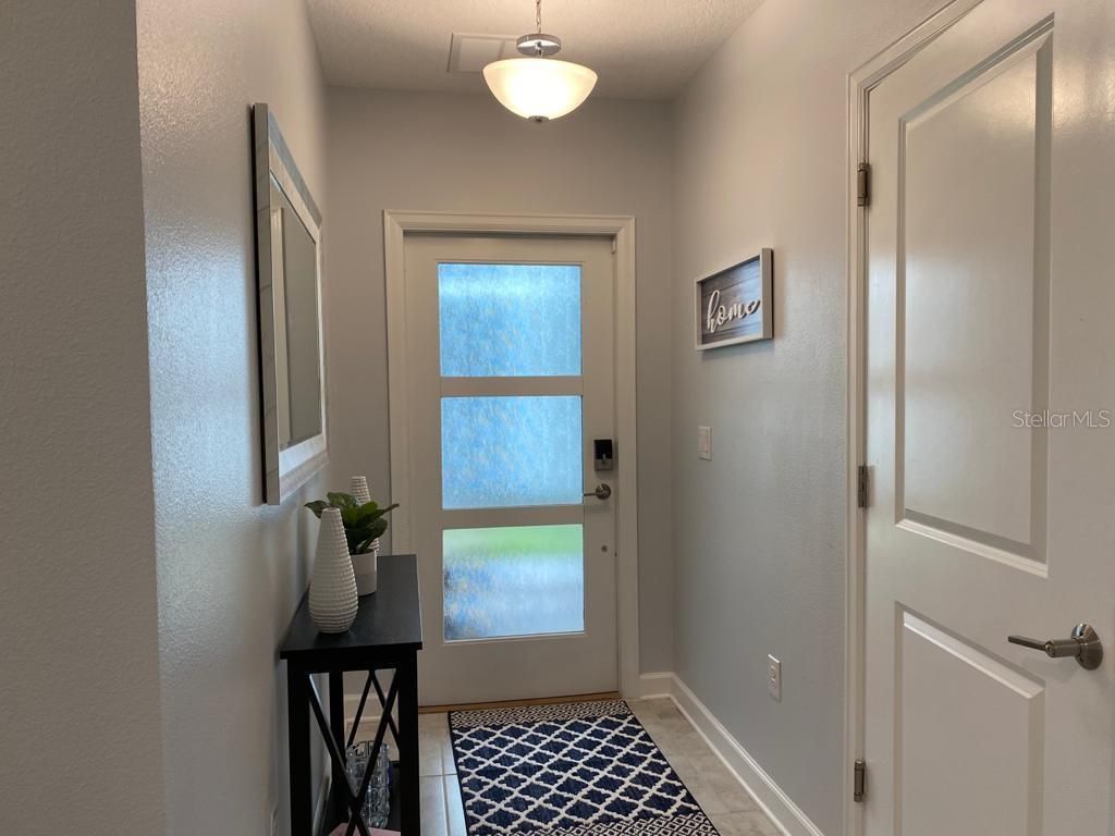 Photo of 637 Ocean Course Avenue, Davenport, FL 33896 (MLS # S5125423)