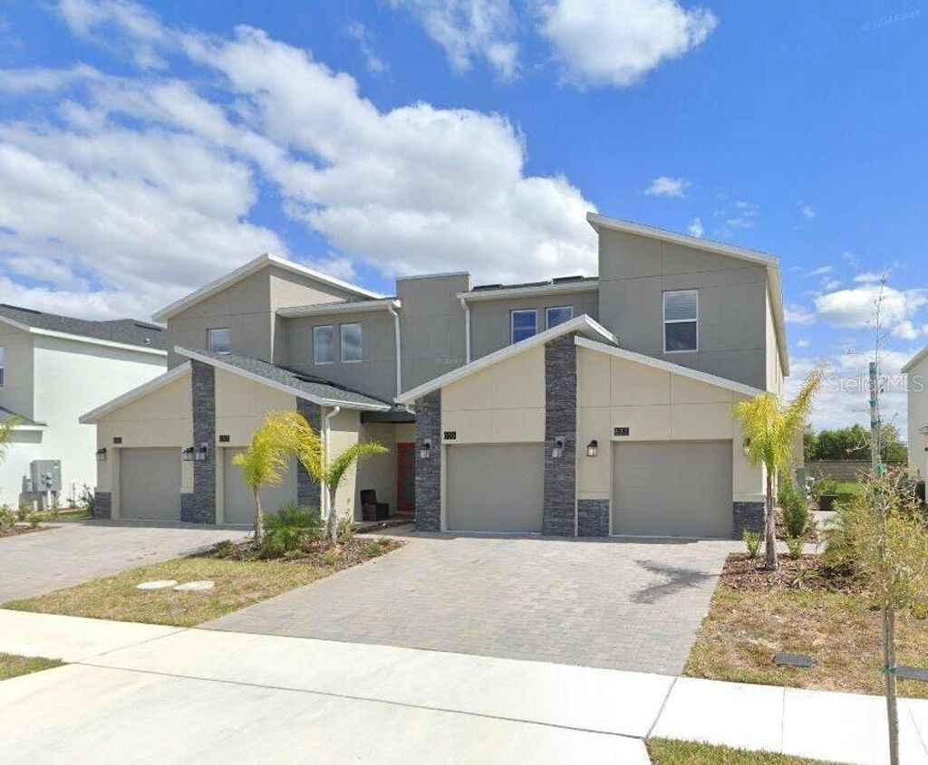 Photo of 637 Ocean Course Avenue, Davenport, FL 33896 (MLS # S5125423)