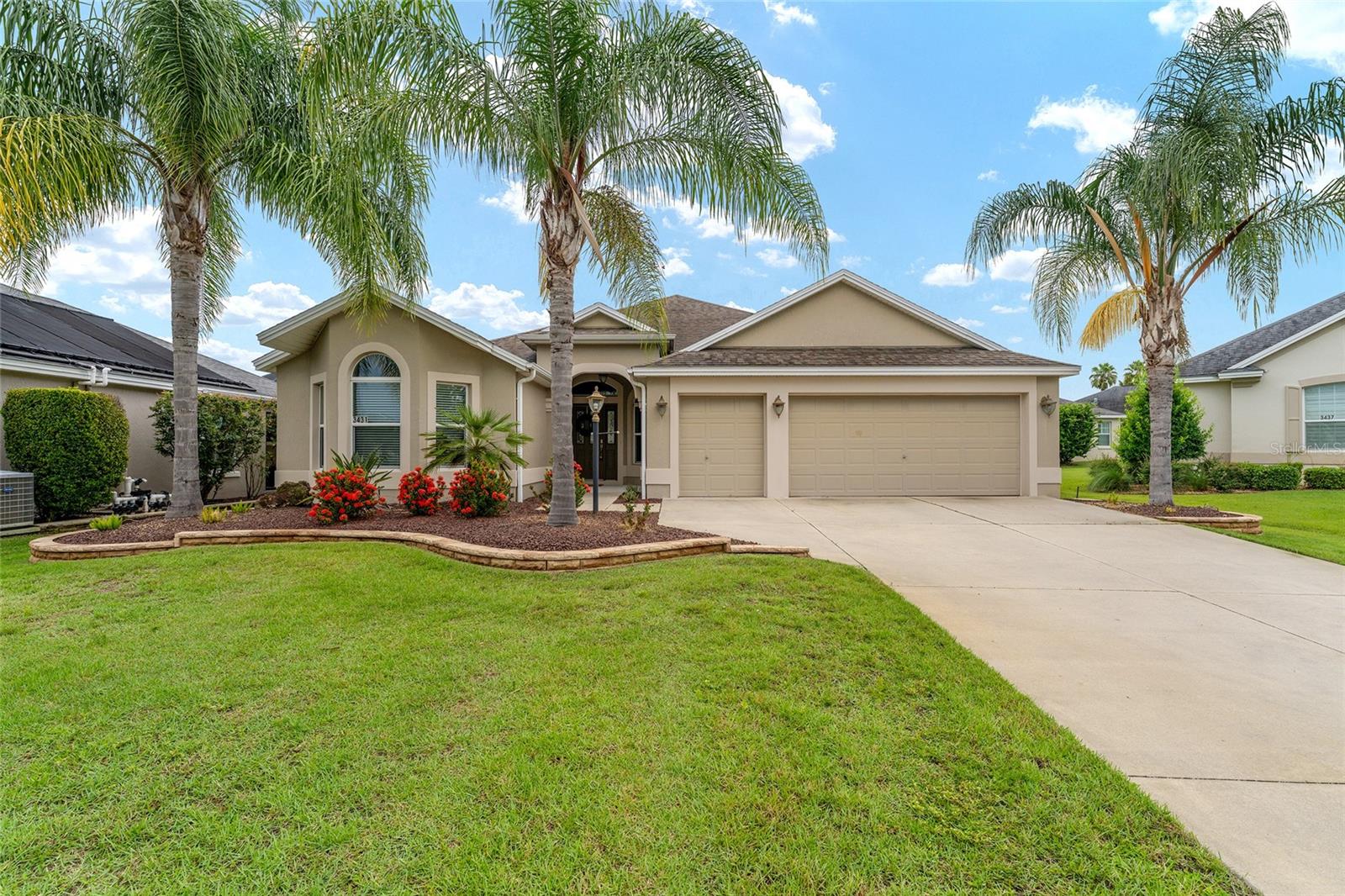 Welcome to this lovely 3-bedroom, 2-bath “BEGONIA” model in highly sought-after Village of COLLIER on quiet cul-de-sac street. Built in 2013 with durable BLOCK/STUCCO construction, this home offers both style and functionality, including a convenient GOLF CART GARAGE. Open-concept floor plan that connects the living, dining, and kitchen areas—ideal for entertaining or everyday living. Kitchen features GRANITE countertops and stacked wood cabinetry with optional glass doors. The spacious living room features a beautifully crafted built-in entertainment wall that adds character and convenience. The split-bedroom layout provides added privacy, with the front bedroom offering flexible use as a den or office WITH CLOSETS in ALL BEDROOMS! Enjoy peaceful mornings and relaxing evenings on the east-facing screened lanai. Located just 1.5 miles from Brownwood Paddock Square, you’ll have easy access to shopping, dining, and nightly entertainment. This home combines comfort, convenience, and community in one of The Villages’ most desirable neighborhoods.