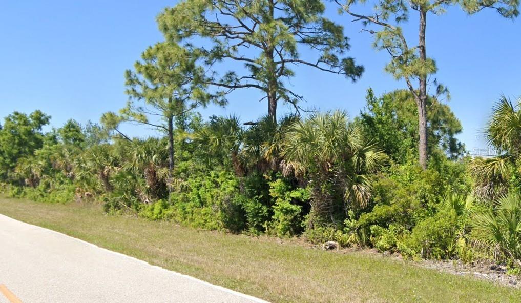 Photo of 3030 Gillot Boulevard, Port Charlotte, FL 33981 (MLS # C7530866)