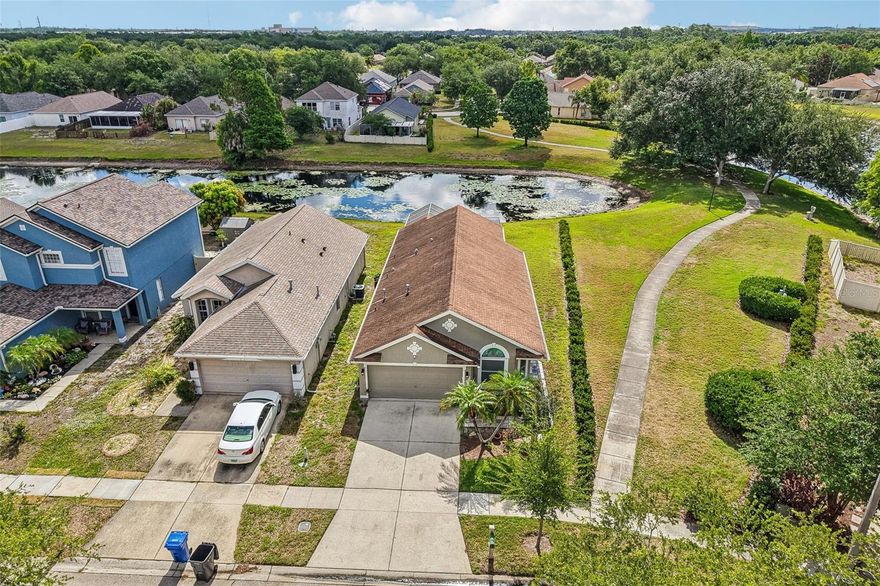 Welcome to a beautiful 3 bedroom 2 bath home in the desirable Covington community surrounded by mature foliage and peaceful natural surroundings. This home features a bright open layout with a living room showcasing vaulted ceilings, creating an airy and spacious feel. The kitchen includes stainless steel appliances and a breakfast bar with views of the family area, making it ideal for both everyday living and entertaining.
A standout feature of this property is the serene pond view, offering a relaxing backdrop right from the backyard. The Florida room showcases panoramic pond views and extends the living space, while a screened in porch provides the perfect setting to enjoy the outdoors year round. The split floor plan provides added privacy with the primary suite set apart from the two guest bedrooms, making it ideal for families, guests, or a flexible work from home setup.
Located in a well established Covington neighborhood with a quiet and natural feel, the home is also situated along a neighborhood walking trail, perfect for morning walks or evening strolls. While offering a peaceful setting, it remains close to shopping, dining, and major roadways, providing a strong balance of comfort and convenience.