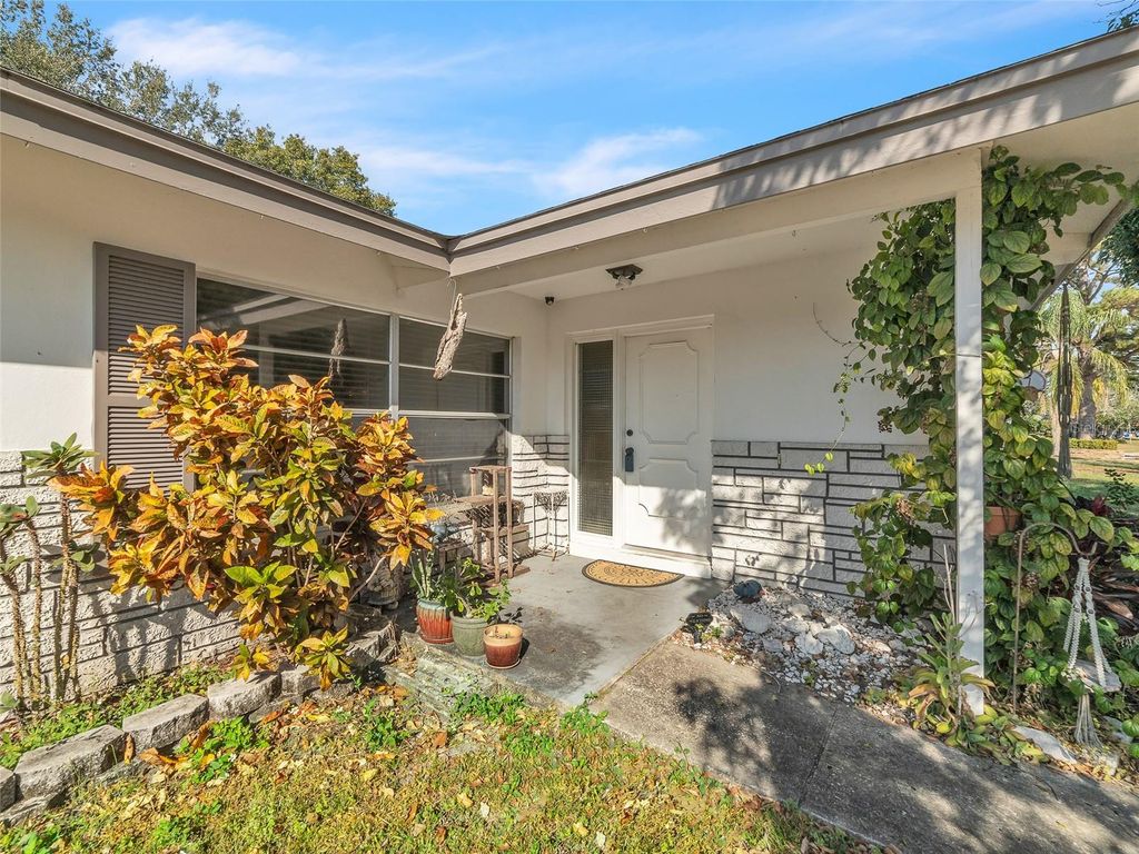 Photo of 1444 Cottonwood Terrace, Dunedin, FL 34698 (MLS # TB8451697)