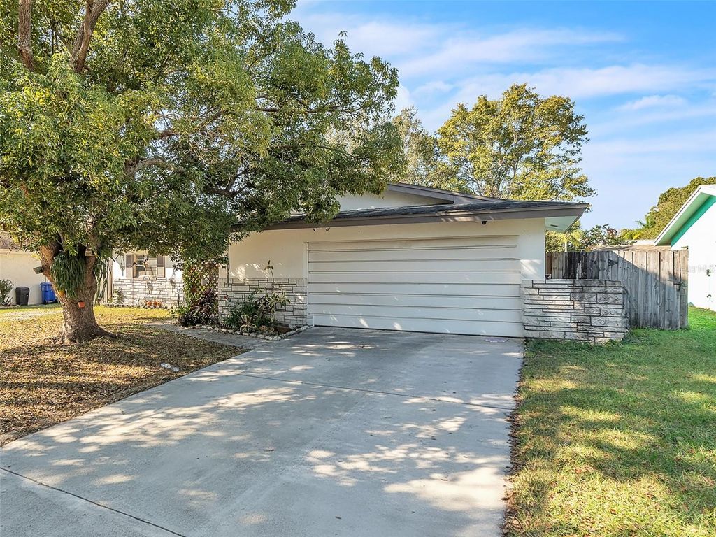 Photo of 1444 Cottonwood Terrace, Dunedin, FL 34698 (MLS # TB8451697)