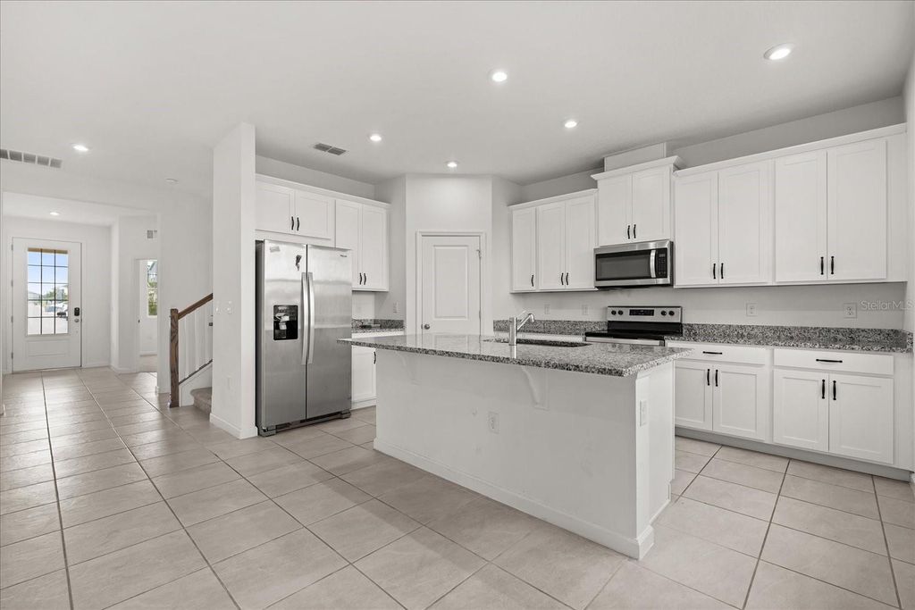 Photo of 1051 Lakeshore Breeze Place, Kissimmee, FL 34747 (MLS # S5148068)