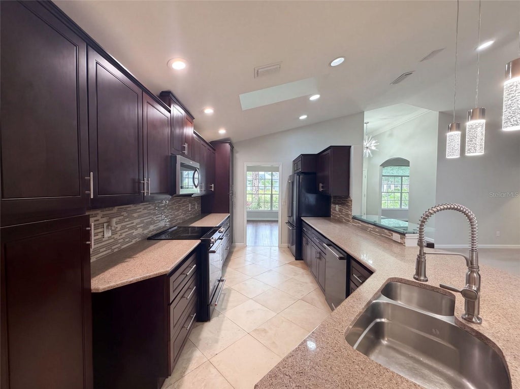 Photo of 455 Longmeadow Lane, Longwood, FL 32779 (MLS # O6448916)