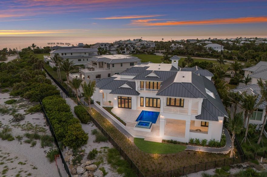 Under Construction. Brand New Construction Now Complete***Quite possibly the most unique waterfront location ever offered for sale in Southwest Florida! Sunrises and Sunsets will be enjoyed here in the winter months together with 180 degrees of Gulf to Bay cerulean waterscape, pristine beaches, nostalgic lighthouse view, and the Historic Boca Grande Pass – AKA ‘The Tarpon Capital of the World’! This exquisite BCB Homes custom built estate offers 8,100 square feet of living space and nearly 3,000 square feet of additional outdoor & garage accommodations. The generous floor plan headlines two magnificent Master / VIP mega suites which is a must see even for the most selective Buyer along with three additional luxurious bedroom ensuites, and a bonus room with full bath that could serve as the sixth guest quarters. In addition, the home showcases a waterfront club room for entertaining, an elegant dining room with decorative ceiling details, and the captivating Sea Watch lounge on second level overlooking the heart of Boca Grande Pass. The well appointed kitchen and family room combination will certainly be a popular gathering place offering panoramic water views and convenient access to the outdoor lanai, pool / spa, and waterfront garden. There is also a spacious den conveniently located off the main entry with a picturesque window overlooking the front garden. The interior finishes were thoughtfully selected by owner to ensure the highest of quality. Ruffino custom Maple cabinetry will be presented in nearly every room together with walnut engineered flooring, meticulously hand crafted cypress and poplar wood finished 12 foot + ceilings, Pompeii quartz & quartzite countertops, and hand laid Walker Zanger tile & stone flooring. Other interior selections will include Sub Zero & Wolf appliances, Lutron lighting control / audio surround, and a custom elevator cabin servicing all floors. The outdoor space is exceptional offering 184 feet of water fronting beachscape and direct access to the inclusive East Beach and Pier. Enjoy entertaining and cooking out in your well equipped outdoor kitchen poolside with convenient remote control shutters and bug screens for added protection against all elements. Exterior construction is just as impressive with storm security being the focal point. The all concrete block structure is fortified with Anderson 400 hurricane rated windows and doors together with a hand etched concrete stucco finish for superior strength and durability. Other exterior construction upgrades include remote hurricane rated shutters, Englert standing seam metal roof, and Clopay hurricane rated garage doors. Multiple outdoor terraces will enhance the exterior profile combined with custom decorative shutters, and the prominent Cupola representing the Architects vision of elegance. All current selections and finishes will be available upon serious inquiries. Hill Tide Estates is majestically positioned along the shores of Boca Grande Pass, Charlotte Harbor, and the Gulf of Mexico. The Gated Community features a private tiered beach, and a unique private fishing / observation pier exclusive for the 19 homeowners.